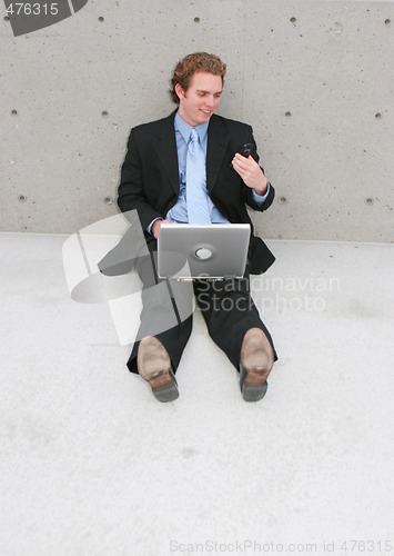Image of businessman sitting