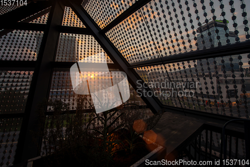 Image of sunset through a glass roof