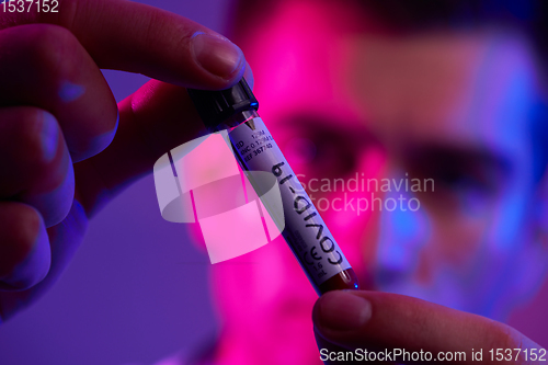 Image of Coronavirus, Doctor holding positive covid-19 virus Blood Sample