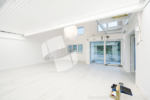 Image of Interior of empty stylish modern open space two level apartment