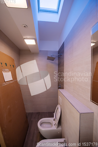 Image of unfinished stylish bathroom interior