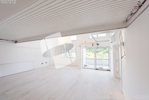 Image of Interior of empty stylish modern open space two level apartment