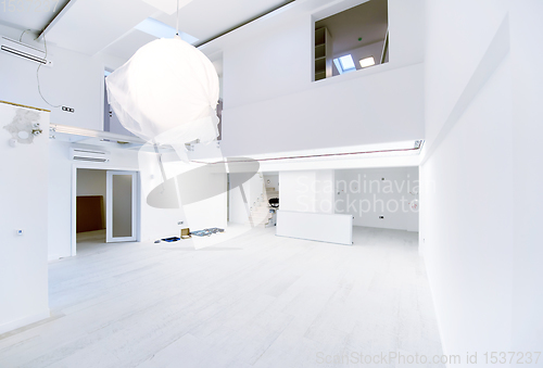 Image of Interior of empty stylish modern open space two level apartment