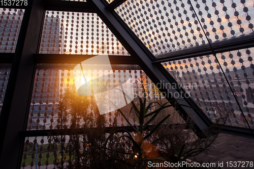 Image of sunset through a glass roof