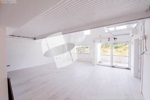 Image of Interior of empty stylish modern open space two level apartment