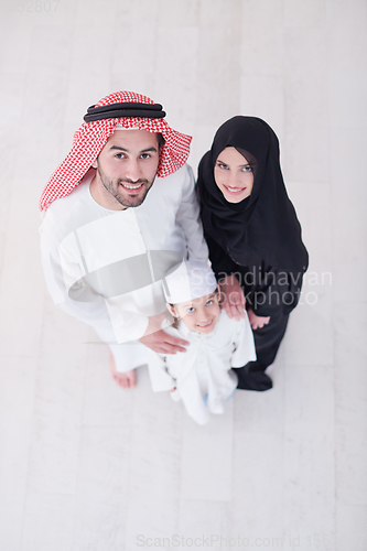 Image of portrait of young happy arabian muslim family top view