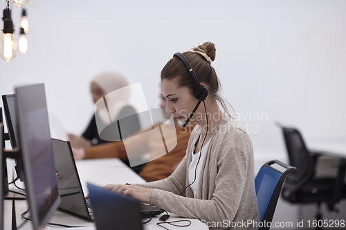 Image of at work  in creative modern coworking startup open space office