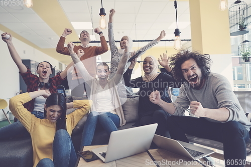 Image of business team celebrating