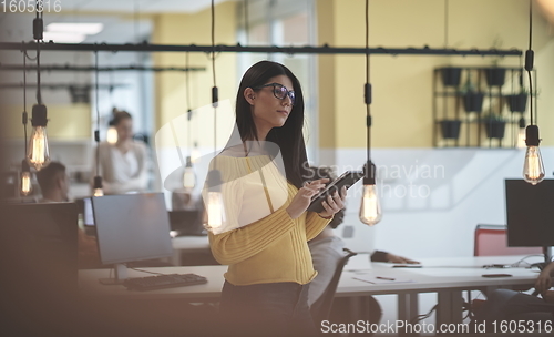 Image of at work  in creative modern coworking startup open space office