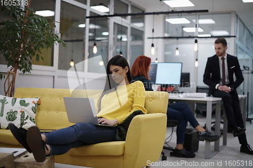 Image of at work  in creative modern coworking startup open space office