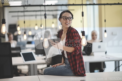 Image of at work  in creative modern coworking startup open space office