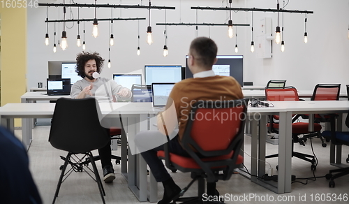 Image of friends at office playing with stress control ball