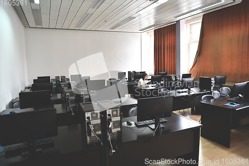 Image of one student in computers classroom