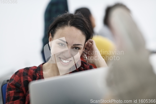 Image of at work  in creative modern coworking startup open space office