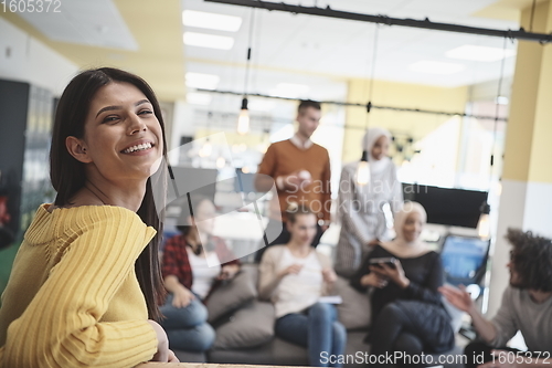 Image of at work  in creative modern coworking startup open space office