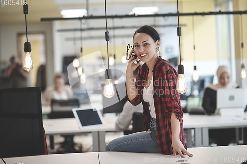 Image of at work  in creative modern coworking startup open space office