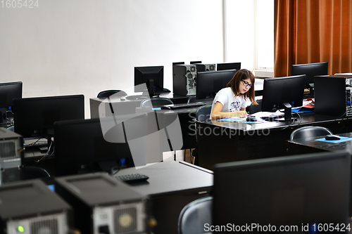 Image of one student in computers classroom