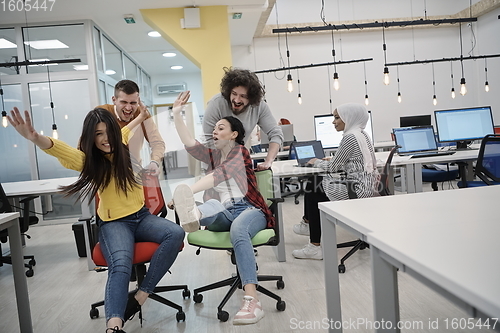 Image of racing on office chairs