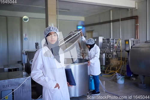 Image of business woman team in local cheese production company