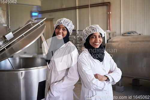 Image of business woman team in local cheese production company