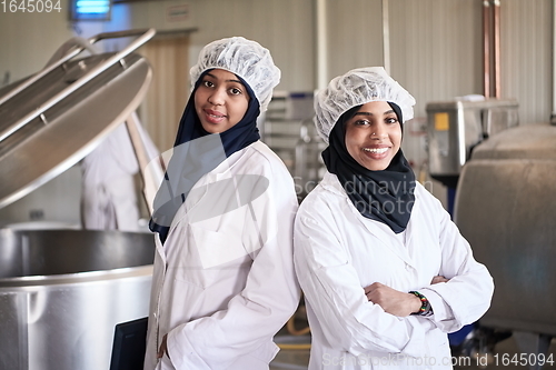 Image of business woman team in local cheese production company