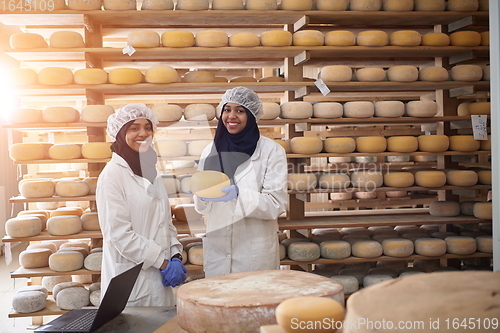 Image of business woman team in local cheese production company