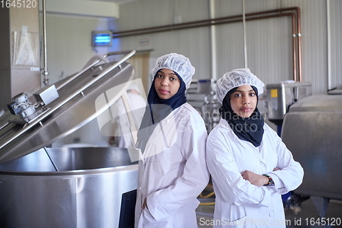 Image of business woman team in local cheese production company