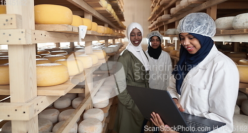 Image of business woman team in local cheese production company