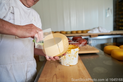 Image of Cheese maker at local production factory