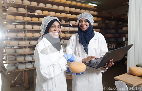 Image of business woman team in local cheese production company