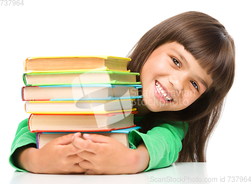 Image of Little girl with her books