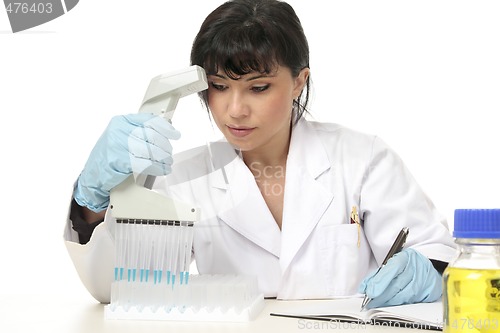 Image of Scientist documenting lab results