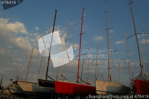 Image of boats at sunset