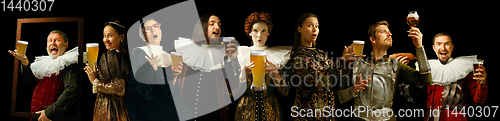 Image of Young people as a medieval grandees on dark background, oktoberfest