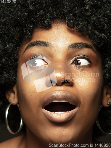 Image of Close up portrait of young african-american emotional girl