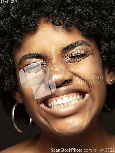 Image of Close up portrait of young african-american emotional girl