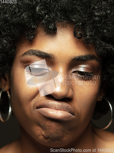 Image of Close up portrait of young african-american emotional girl