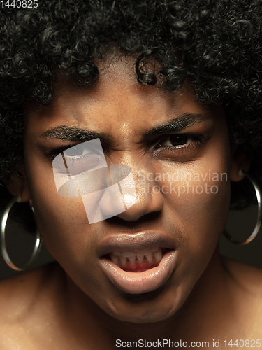 Image of Close up portrait of young african-american emotional girl