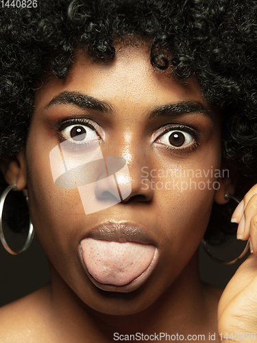 Image of Close up portrait of young african-american emotional girl