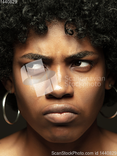 Image of Close up portrait of young african-american emotional girl