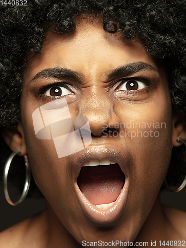 Image of Close up portrait of young african-american emotional girl