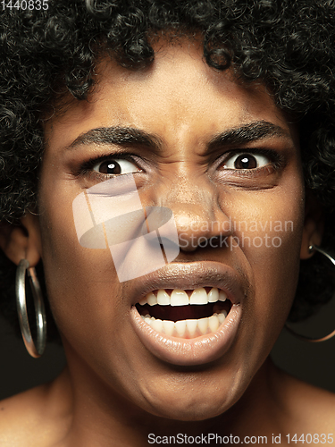 Image of Close up portrait of young african-american emotional girl