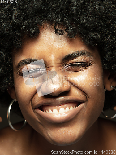 Image of Close up portrait of young african-american emotional girl