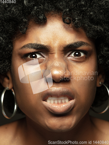 Image of Close up portrait of young african-american emotional girl