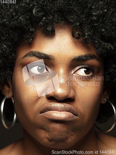 Image of Close up portrait of young african-american emotional girl