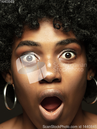 Image of Close up portrait of young african-american emotional girl