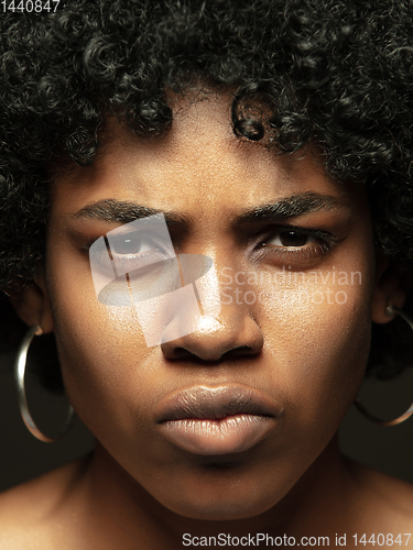 Image of Close up portrait of young african-american emotional girl