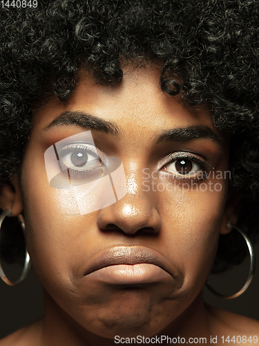 Image of Close up portrait of young african-american emotional girl