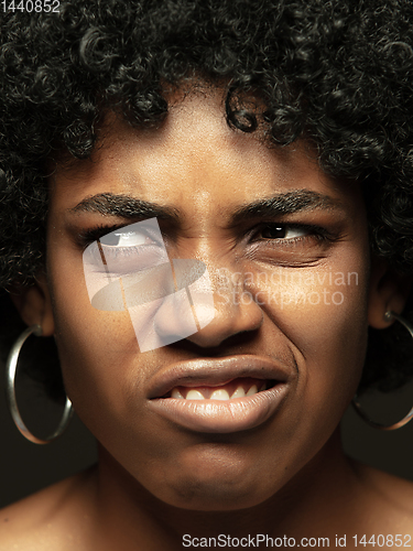 Image of Close up portrait of young african-american emotional girl