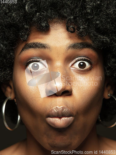 Image of Close up portrait of young african-american emotional girl